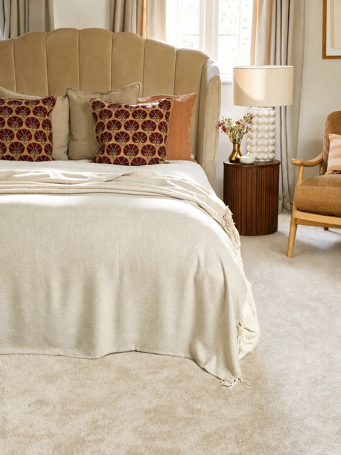A calm cream bedroom with a deep-pile fitted carpet at Job's of Oxted